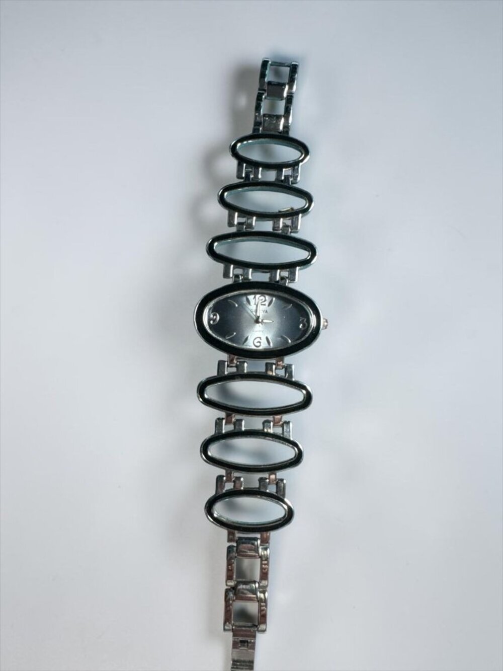 Geneva Quartz Womens Oval Silver-Tone Bracelet Watch With Unique Open-Link Desig
